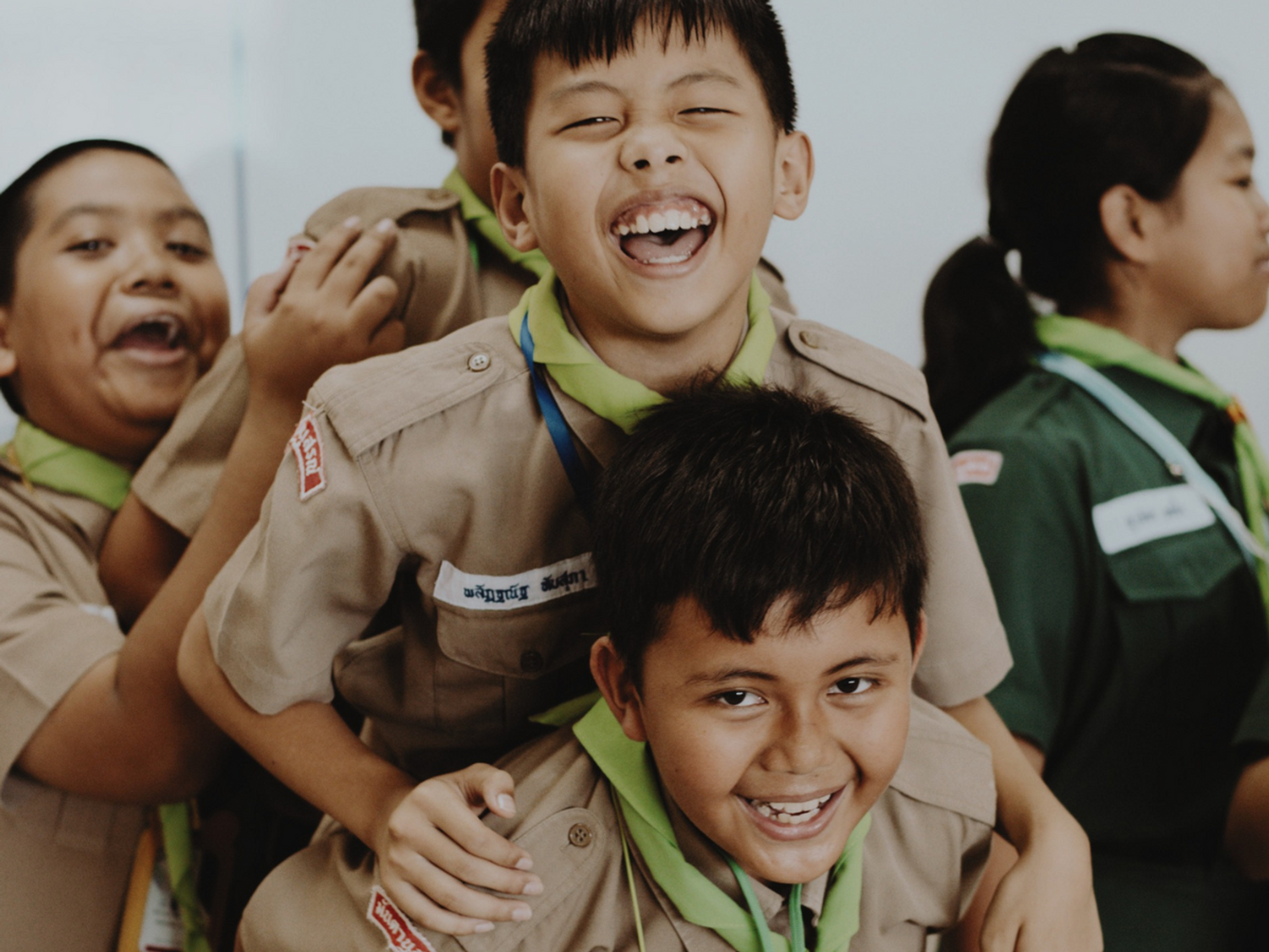 Students in a group smiling