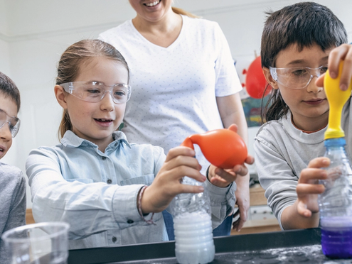 Students learning science in a classroom